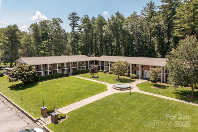 102 Boyd Dr Unit 7A, Flat Rock, NC 28731 - view of front of house featuring a front lawn