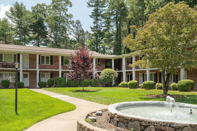 102 Boyd Dr Unit 7A, Flat Rock, NC 28731 - view of property's community with a yard