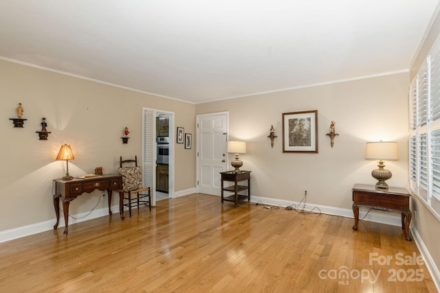 102 Boyd Dr Unit 7A, Flat Rock, NC 28731 - living area with light wood finished floors and crown molding