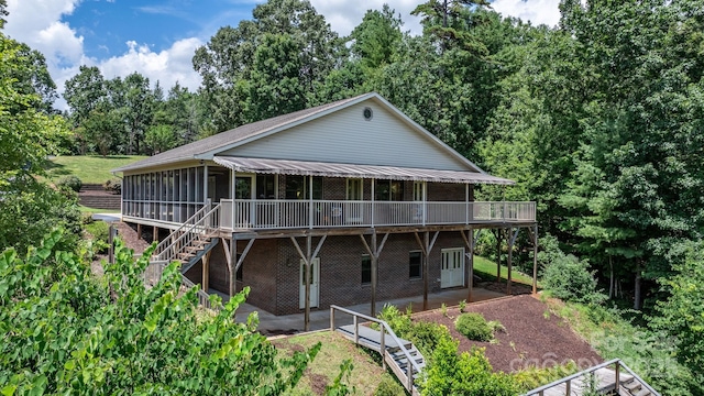 2066 Waterford Way, Morganton, NC 28655 - rear view of property featuring a sunroom, stairway, a deck, and a patio