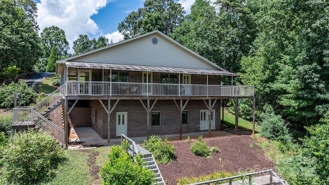 2066 Waterford Way, Morganton, NC 28655 - rear view of house with a deck, brick siding, stairway, and a patio