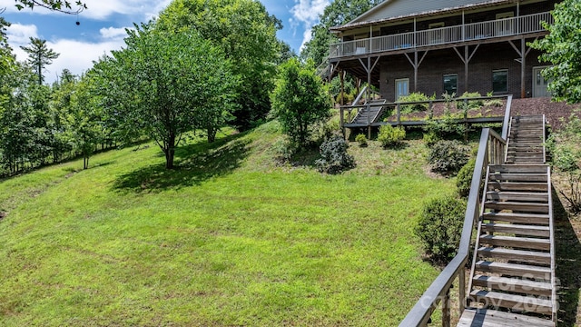 2066 Waterford Way, Morganton, NC 28655 - view of green lawn with stairs and a deck