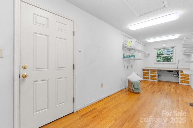 2066 Waterford Way, Morganton, NC 28655 - miscellaneous room with light wood finished floors and a textured ceiling