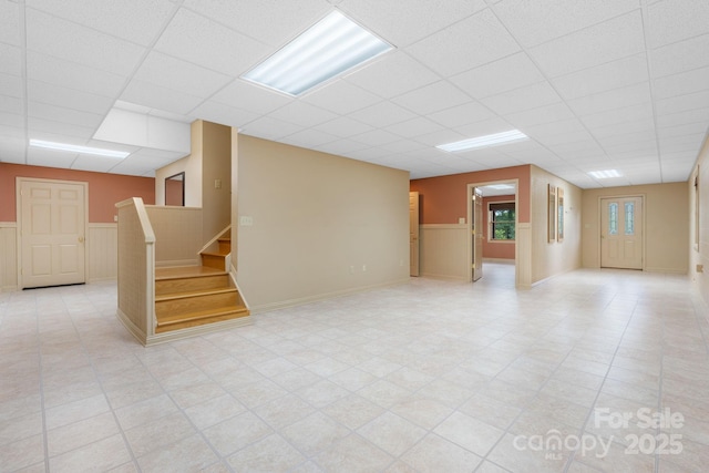2066 Waterford Way, Morganton, NC 28655 - basement with a paneled ceiling, a wainscoted wall, and stairs