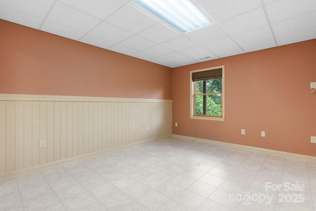 2066 Waterford Way, Morganton, NC 28655 - spare room with a drop ceiling and wainscoting