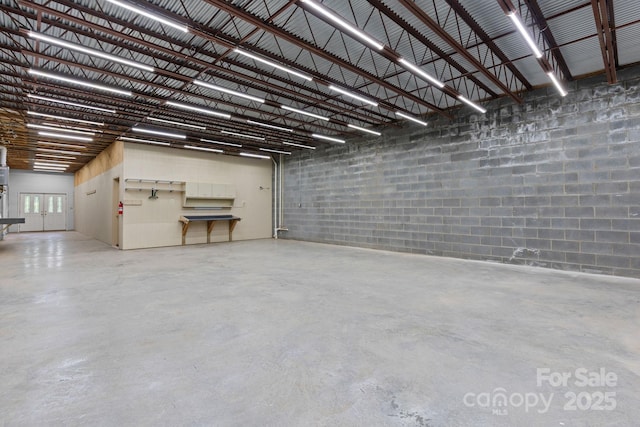 2066 Waterford Way, Morganton, NC 28655 - garage featuring french doors and concrete block wall