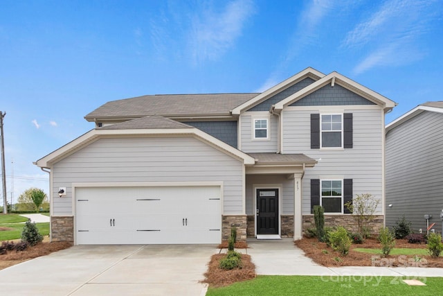 2589 Blue Sky Meadows Dr, Monroe, NC 28110 - craftsman-style home with stone siding, driveway, and an attached garage