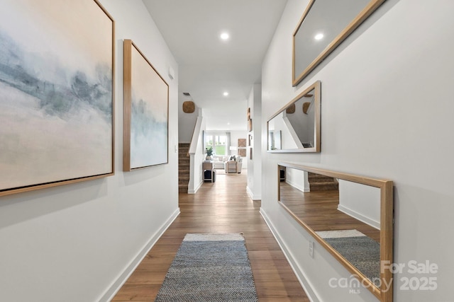 2589 Blue Sky Meadows Dr, Monroe, NC 28110 - corridor featuring recessed lighting, wood finished floors, and stairway