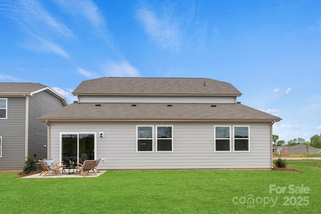 2589 Blue Sky Meadows Dr, Monroe, NC 28110 - rear view of house with a patio area, a yard, and a shingled roof