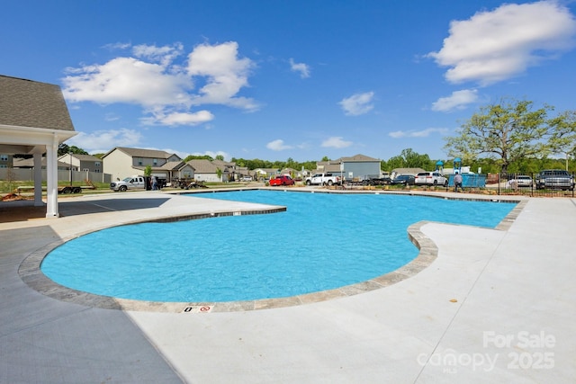 2589 Blue Sky Meadows Dr, Monroe, NC 28110 - community pool with a residential view and a patio