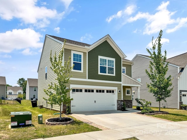 2807 Oldfield Dr, Monroe, NC 28110 - craftsman-style house featuring concrete driveway, a garage, and a front lawn