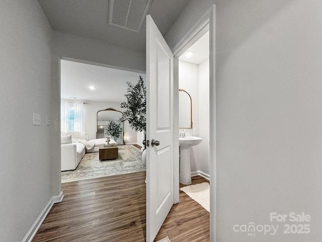 2807 Oldfield Dr, Monroe, NC 28110 - corridor with wood finished floors and baseboards