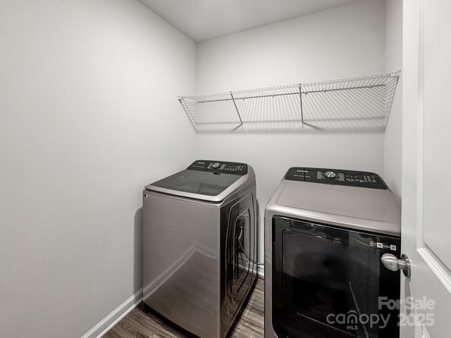 2807 Oldfield Dr, Monroe, NC 28110 - laundry room featuring separate washer and dryer and wood finished floors