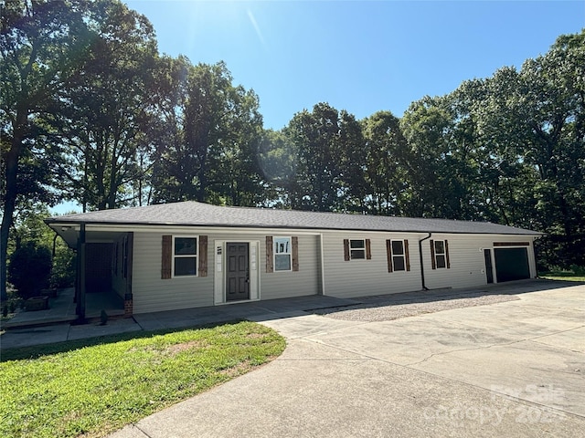 5335 NC-152 Hwy W, China Grove, NC 28023 - view of front of home with driveway, a garage, and covered porch