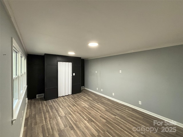 5335 NC-152 Hwy W, China Grove, NC 28023 - unfurnished bedroom with dark wood finished floors, recessed lighting, and crown molding