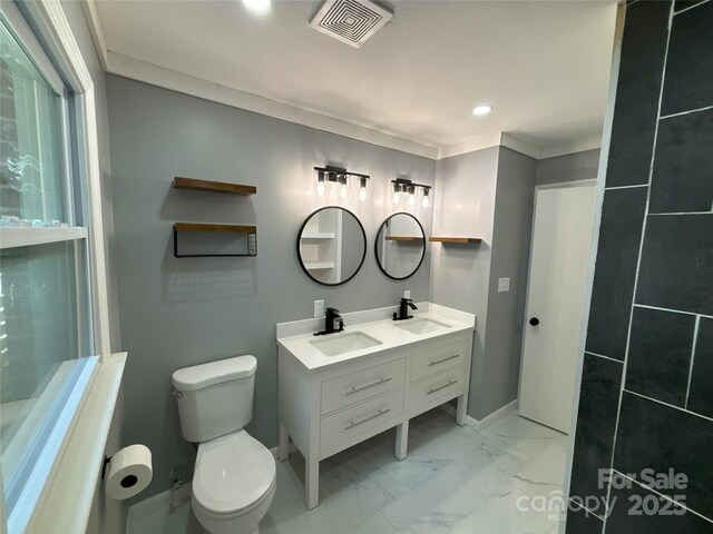 5335 NC-152 Hwy W, China Grove, NC 28023 - full bath with double vanity, recessed lighting, and marble finish flooring