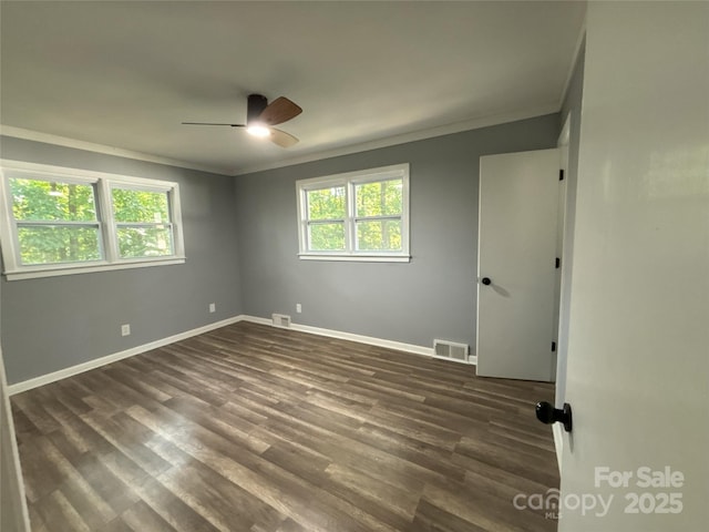 5335 NC-152 Hwy W, China Grove, NC 28023 - unfurnished room featuring crown molding, a ceiling fan, and dark wood-type flooring