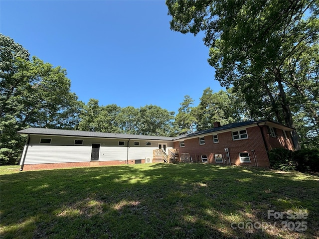 5335 NC-152 Hwy W, China Grove, NC 28023 - rear view of property with a lawn, brick siding, and a chimney