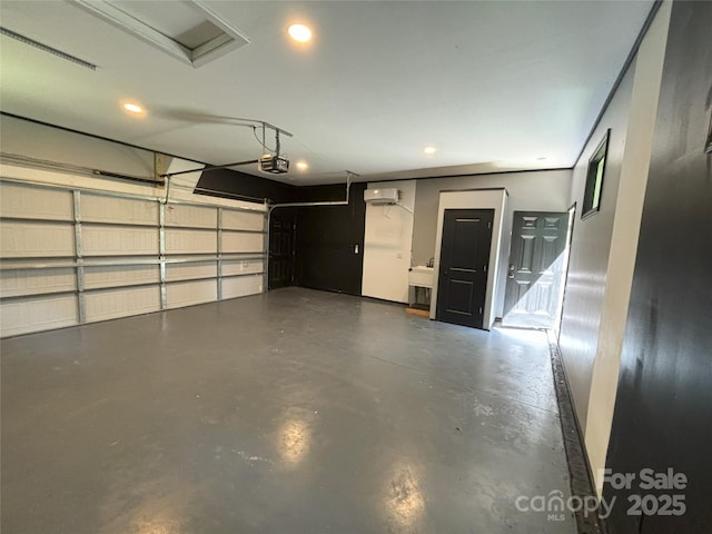 5335 NC-152 Hwy W, China Grove, NC 28023 - garage with a garage door opener, recessed lighting, and a wall mounted AC