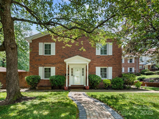 1411 Kensington Rd Unit C-1, Hendersonville, NC 28791 - colonial home with brick siding and a front yard