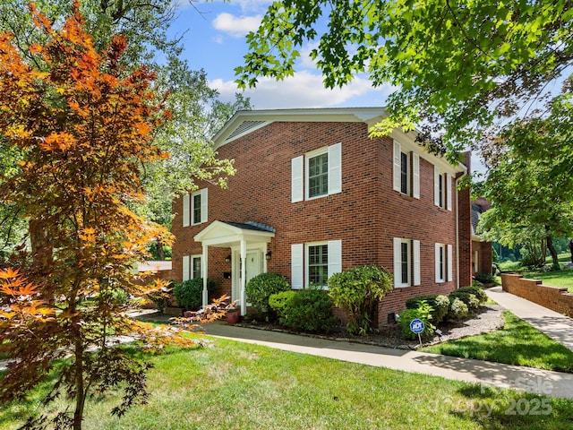 1411 Kensington Rd Unit C-1, Hendersonville, NC 28791 - colonial inspired home with brick siding and a front yard