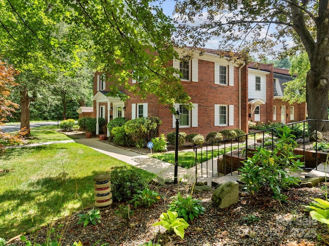 1411 Kensington Rd Unit C-1, Hendersonville, NC 28791 - colonial house with a front yard and brick siding