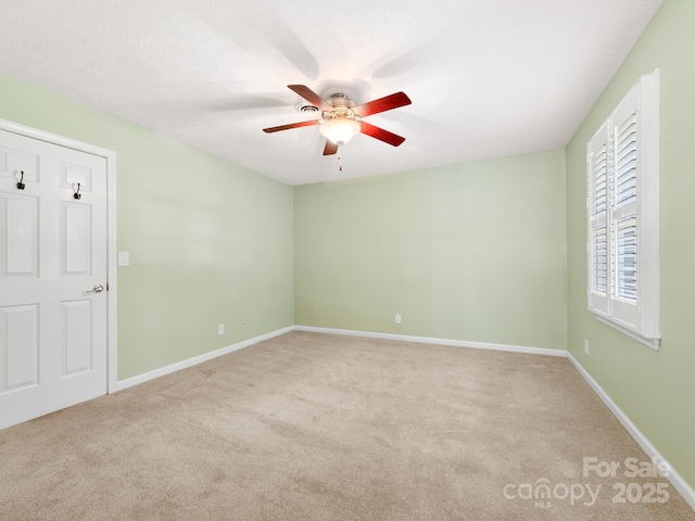 1411 Kensington Rd Unit C-1, Hendersonville, NC 28791 - unfurnished bedroom with carpet floors and a ceiling fan