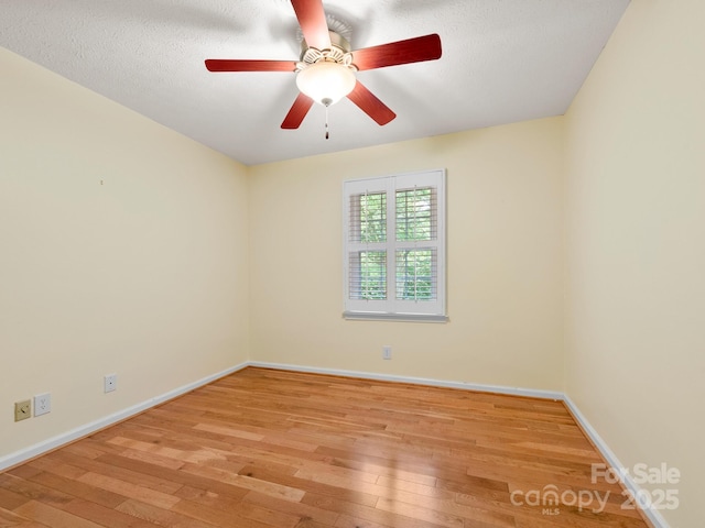 1411 Kensington Rd Unit C-1, Hendersonville, NC 28791 - unfurnished room featuring light wood-type flooring and ceiling fan