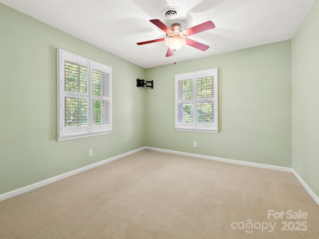 1411 Kensington Rd Unit C-1, Hendersonville, NC 28791 - unfurnished room with light carpet and ceiling fan