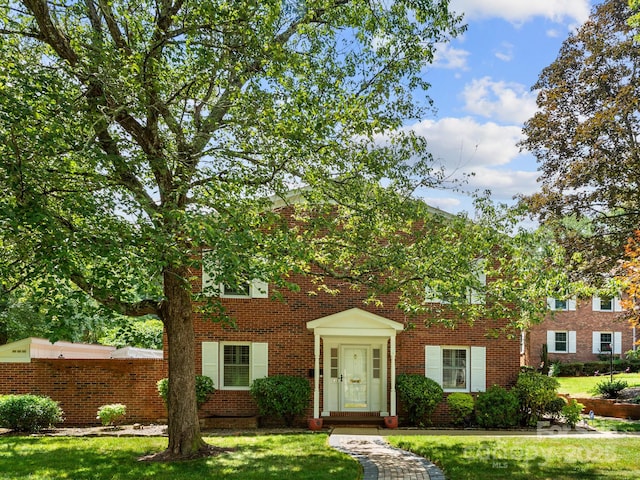 1411 Kensington Rd Unit C-1, Hendersonville, NC 28791 - colonial house with brick siding and a front lawn