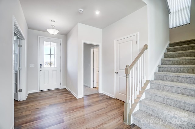 1700 Honey Trl, Monroe, NC 28112 - foyer featuring wood finished floors and stairway