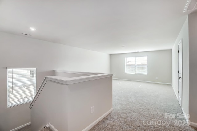 1700 Honey Trl, Monroe, NC 28112 - hallway featuring an upstairs landing and light colored carpet