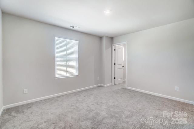 1700 Honey Trl, Monroe, NC 28112 - carpeted spare room with baseboards