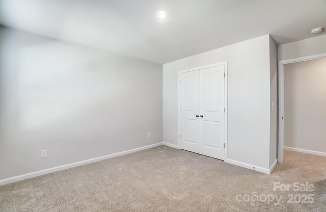 1700 Honey Trl, Monroe, NC 28112 - unfurnished bedroom featuring carpet and a closet