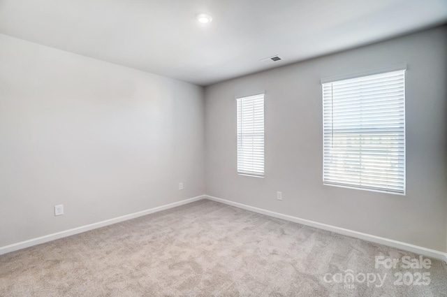 1700 Honey Trl, Monroe, NC 28112 - empty room featuring baseboards and light colored carpet