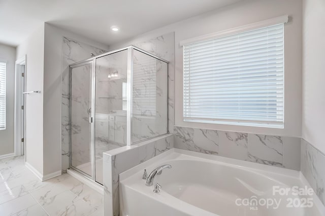 1700 Honey Trl, Monroe, NC 28112 - bathroom featuring a bath, a marble finish shower, marble finish floors, and recessed lighting