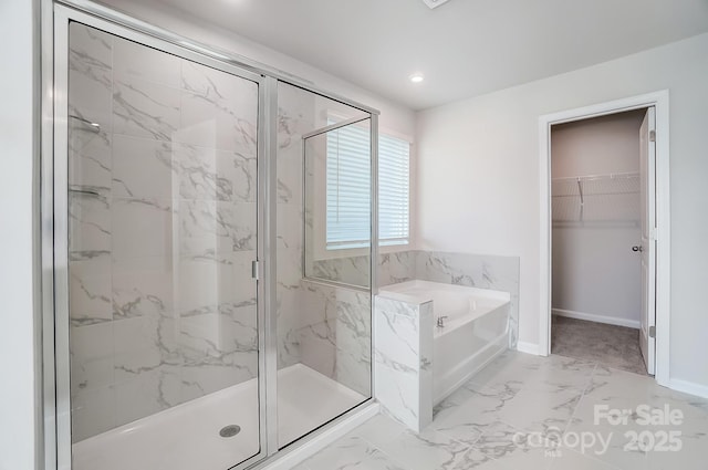 1700 Honey Trl, Monroe, NC 28112 - full bathroom with a garden tub, a marble finish shower, marble finish floors, a spacious closet, and recessed lighting