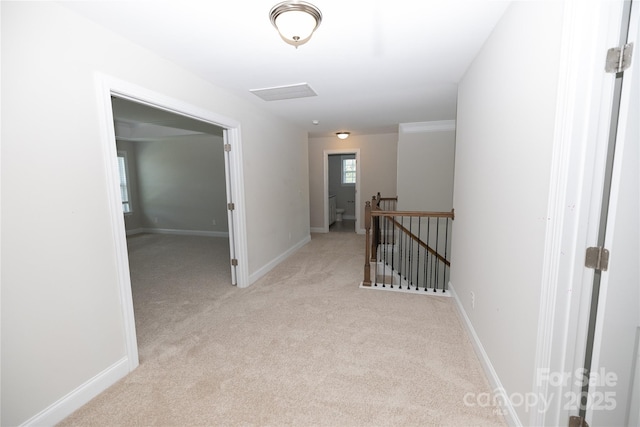 128 Carolina Ash Ln, Mooresville, NC 28117 - corridor featuring an upstairs landing and light colored carpet
