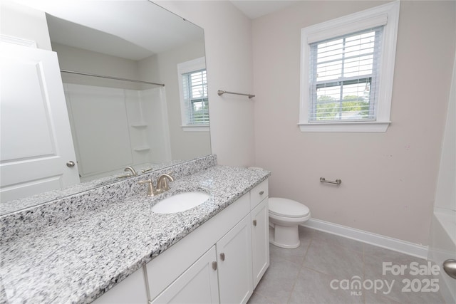 128 Carolina Ash Ln, Mooresville, NC 28117 - full bathroom featuring vanity, healthy amount of natural light, a shower, and tile patterned flooring