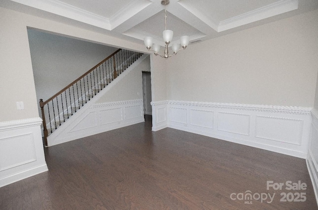 128 Carolina Ash Ln, Mooresville, NC 28117 - unfurnished room with coffered ceiling, beam ceiling, stairs, a decorative wall, and a chandelier