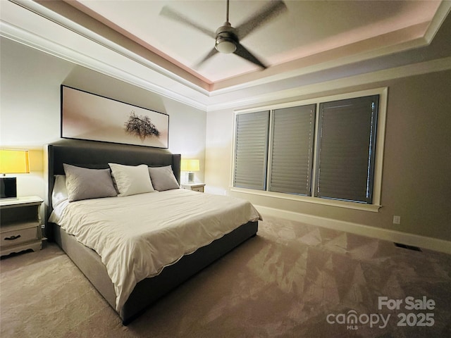 7816 Clovervale Dr, Waxhaw, NC 28173 - bedroom featuring a tray ceiling, light carpet, and ceiling fan