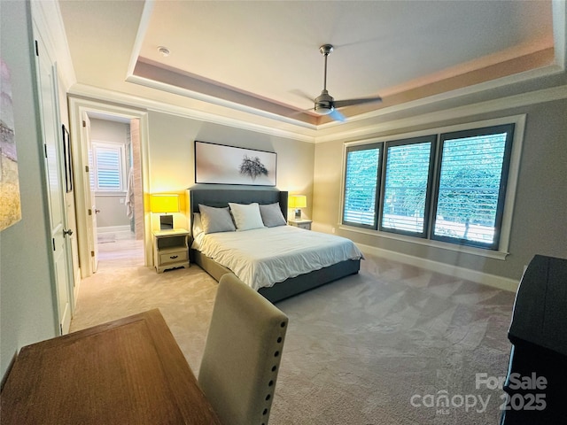 7816 Clovervale Dr, Waxhaw, NC 28173 - bedroom with a raised ceiling, light carpet, and a ceiling fan