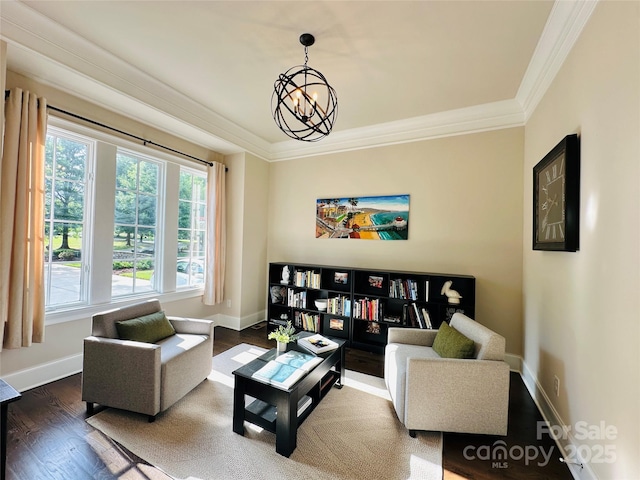7816 Clovervale Dr, Waxhaw, NC 28173 - living room featuring crown molding, wood finished floors, and a chandelier