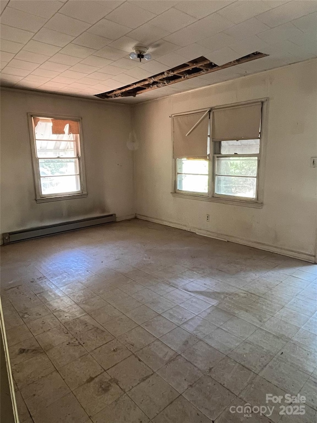 927 Steep Hill Rd Unit P/60, Belmont, NC 28012 - unfurnished room with a baseboard radiator and tile patterned floors