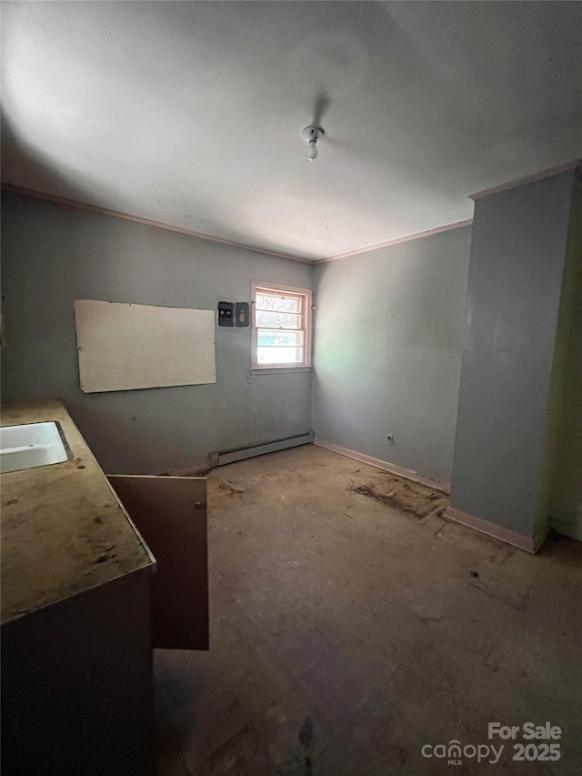 927 Steep Hill Rd Unit P/60, Belmont, NC 28012 - empty room featuring a baseboard radiator and crown molding