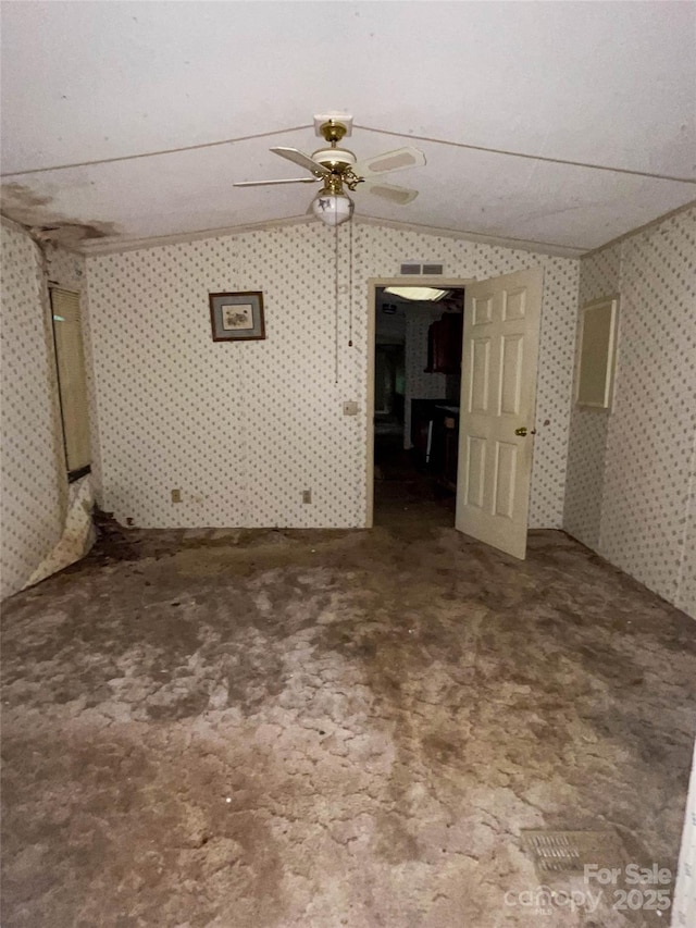 916 Steep Hill Rd, Belmont, NC 28012 - unfurnished living room with wallpapered walls, a ceiling fan, carpet, and vaulted ceiling