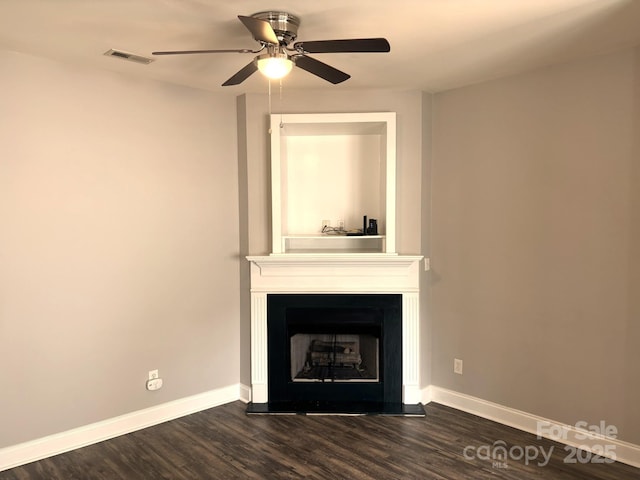 917 Shearer St Unit 15, Davidson, NC 28036 - unfurnished living room with a ceiling fan, a large fireplace, and dark wood-style flooring