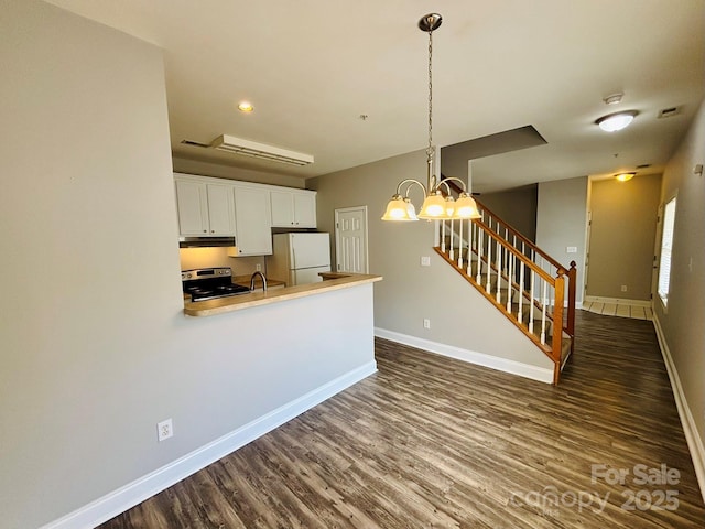 917 Shearer St Unit 15, Davidson, NC 28036 - kitchen featuring freestanding refrigerator, stainless steel electric range, under cabinet range hood, dark wood finished floors, and recessed lighting