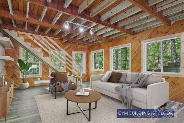 295 Dills Rd, Bryson City, NC 28713 - sunroom featuring beamed ceiling and rail lighting