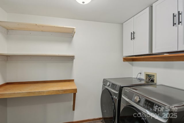295 Dills Rd, Bryson City, NC 28713 - laundry room with cabinet space and washer and clothes dryer